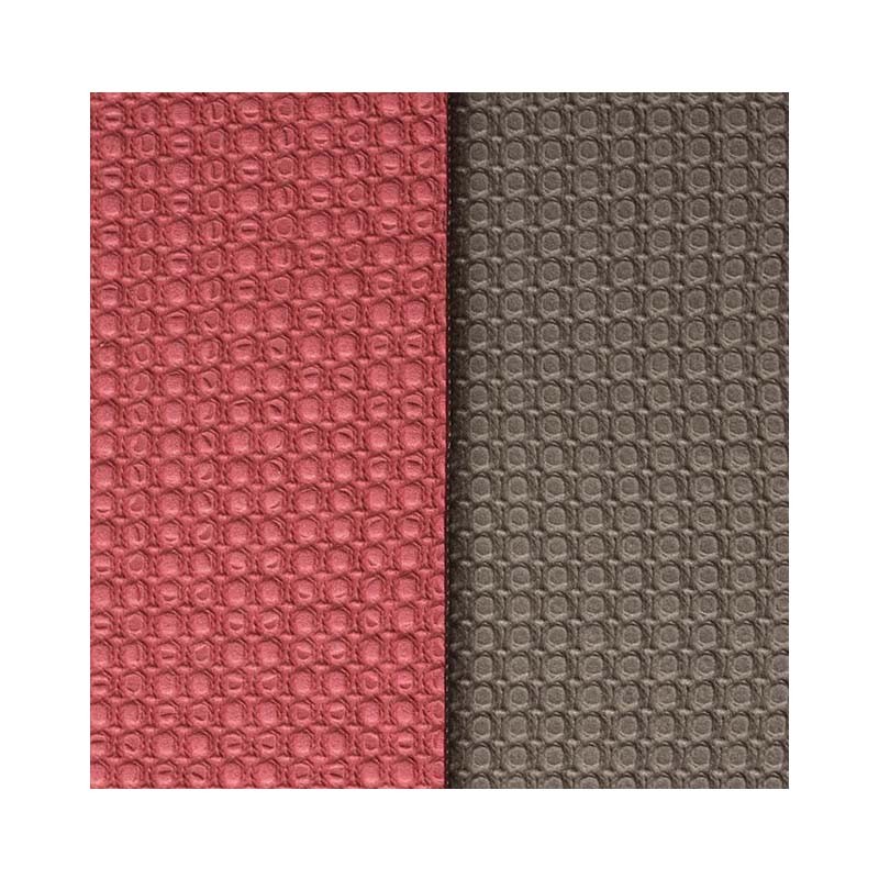 TPE yoga mat features textured surfaces on both sides to enhance grip and prevent slipping, while offering excellent elasticity for comfort and support during practice.